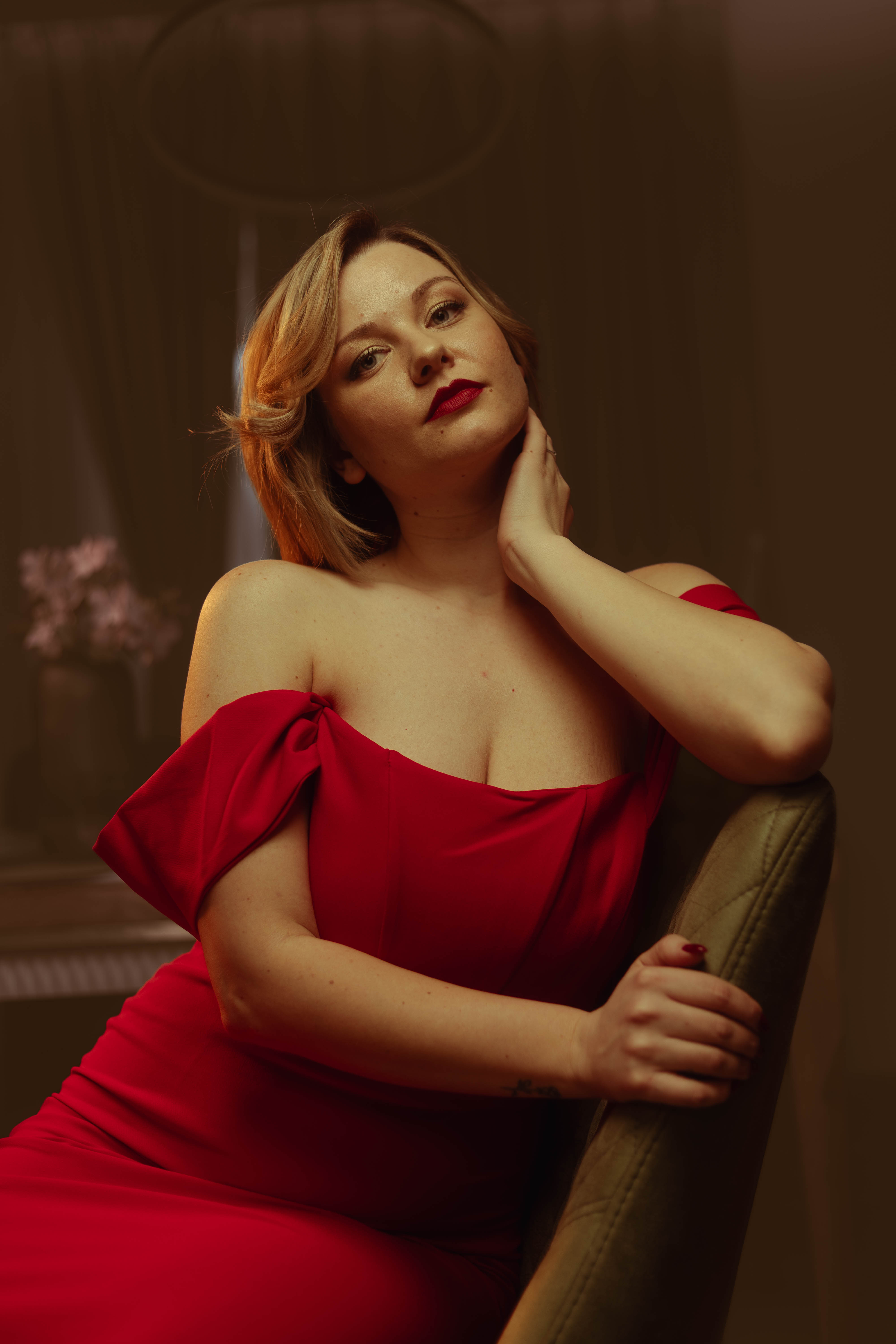 Luxury portrait, red dress, eyes closed, dreamy painterly mood