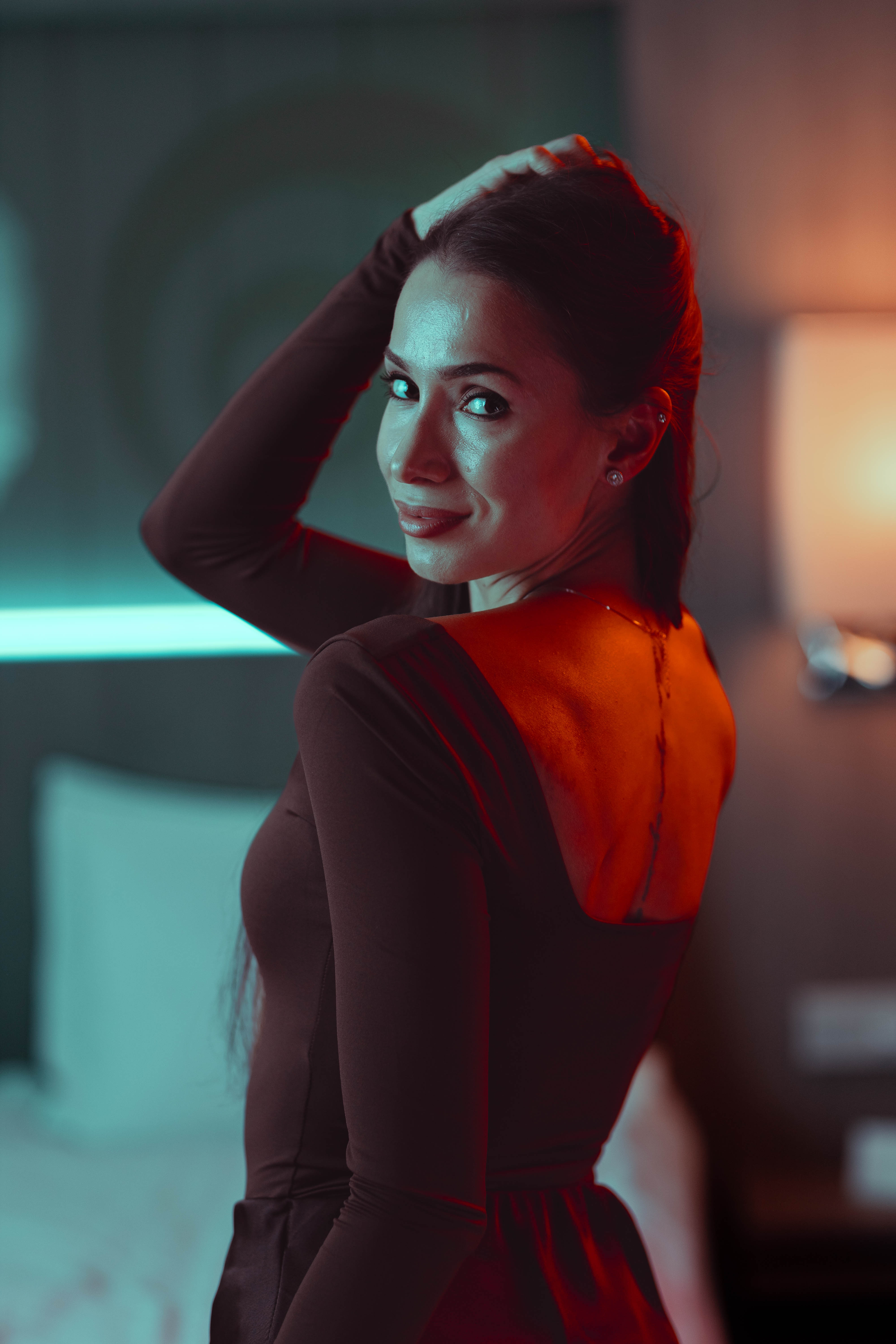 Luxury portrait, sculpted fur turn, teal back light and amber glow