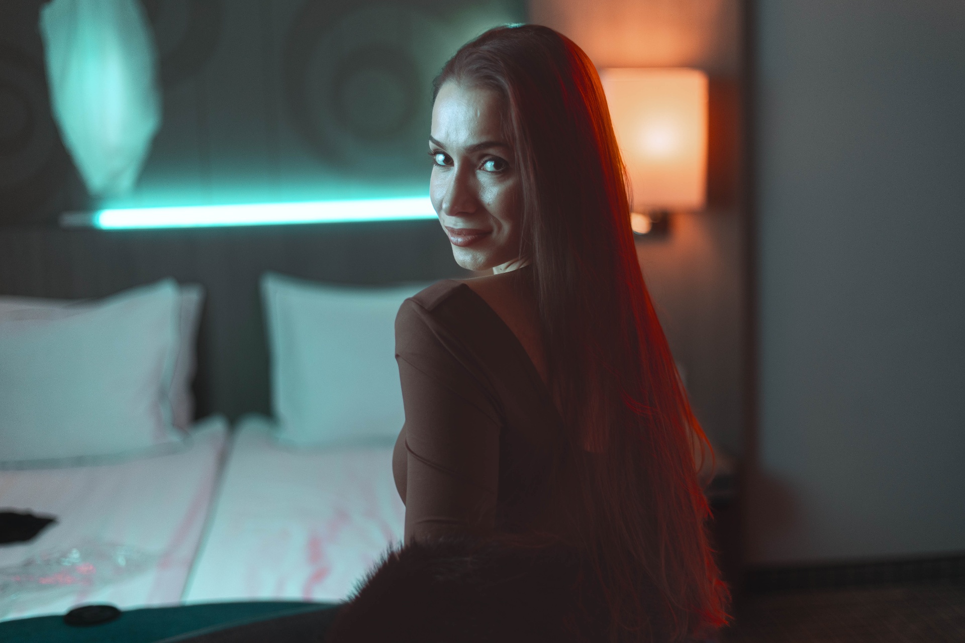 Fashion film still, dual-tone teal and ember palette
